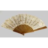 Circa 1900 Carved Fan With a Brussels Lace Mount, floral pierced sticks and guards carved with birds