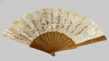 Circa 1900 Carved Fan With a Brussels Lace Mount, floral pierced sticks and guards carved with birds