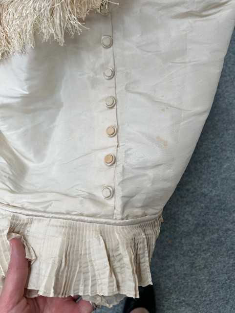 Victorian Cream Silk Wedding Dress with multi pleated trims to the front, cuffs and hem, button - Image 8 of 11