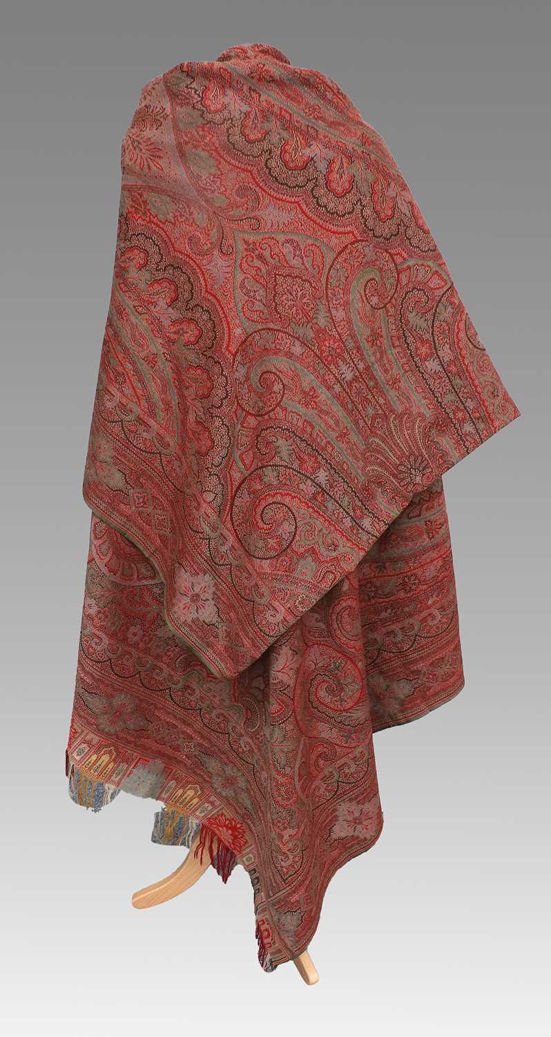 Large 19th Century Woven Red Ground Paisley Shawl/Cloth, 170cm by 345cm Fading and wear overall. - Image 4 of 8