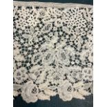 Late 19th/Early 20th Century Honiton Lace Flounce, worked with decorative flower heads, thistle
