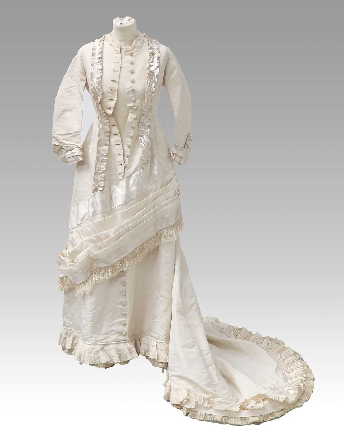 Victorian Cream Silk Wedding Dress with multi pleated trims to the front, cuffs and hem, button