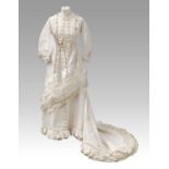 Victorian Cream Silk Wedding Dress with multi pleated trims to the front, cuffs and hem, button
