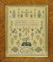 A Sampler by Mary Ann Jordan aged 13 Years, 1850 with a central religious verse worked with