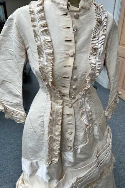 Victorian Cream Silk Wedding Dress with multi pleated trims to the front, cuffs and hem, button - Image 7 of 11