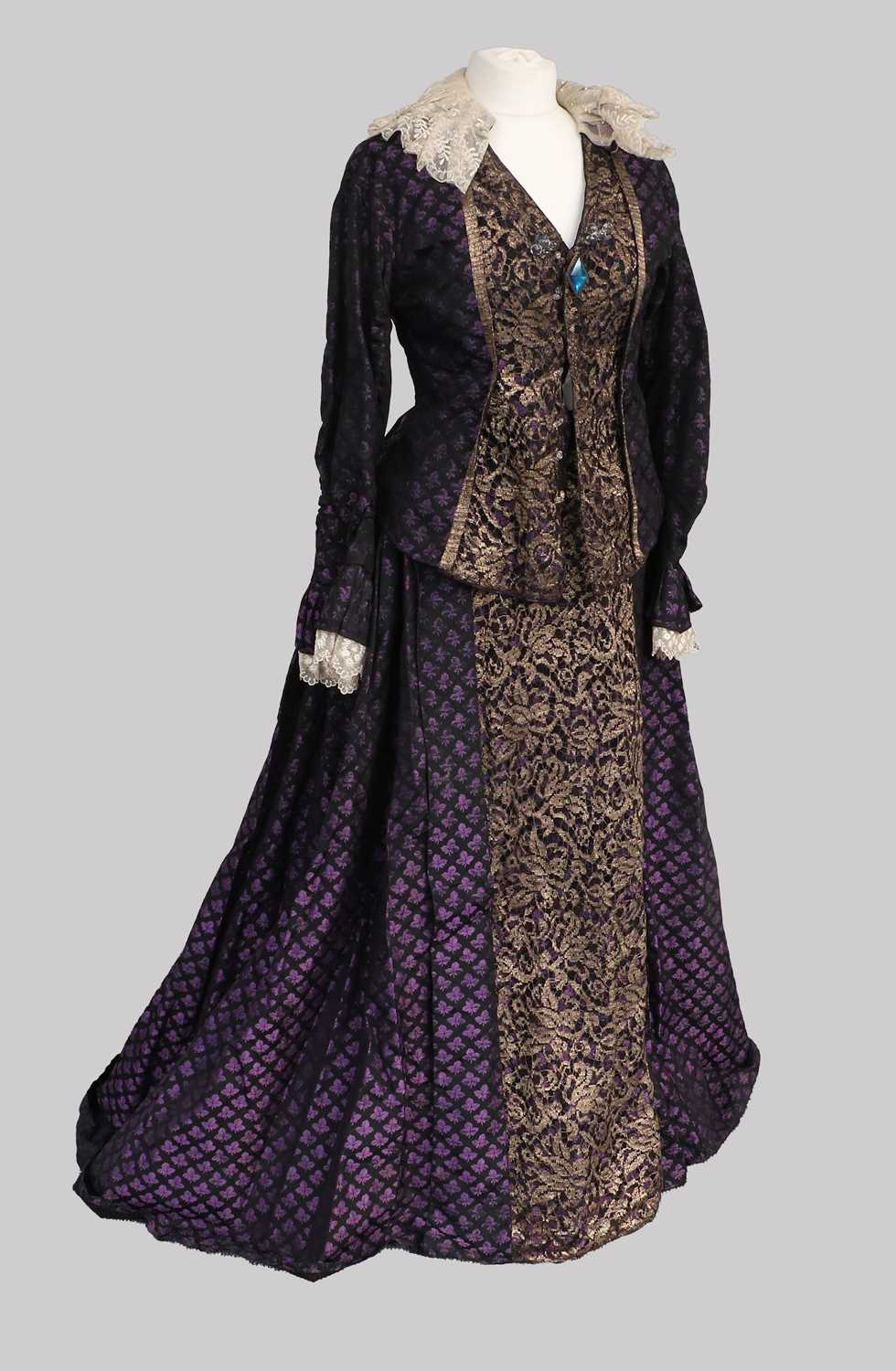 19th Century Purple and Black Silk Brocade Two Piece, comprising a fitted long sleeve jacket woven