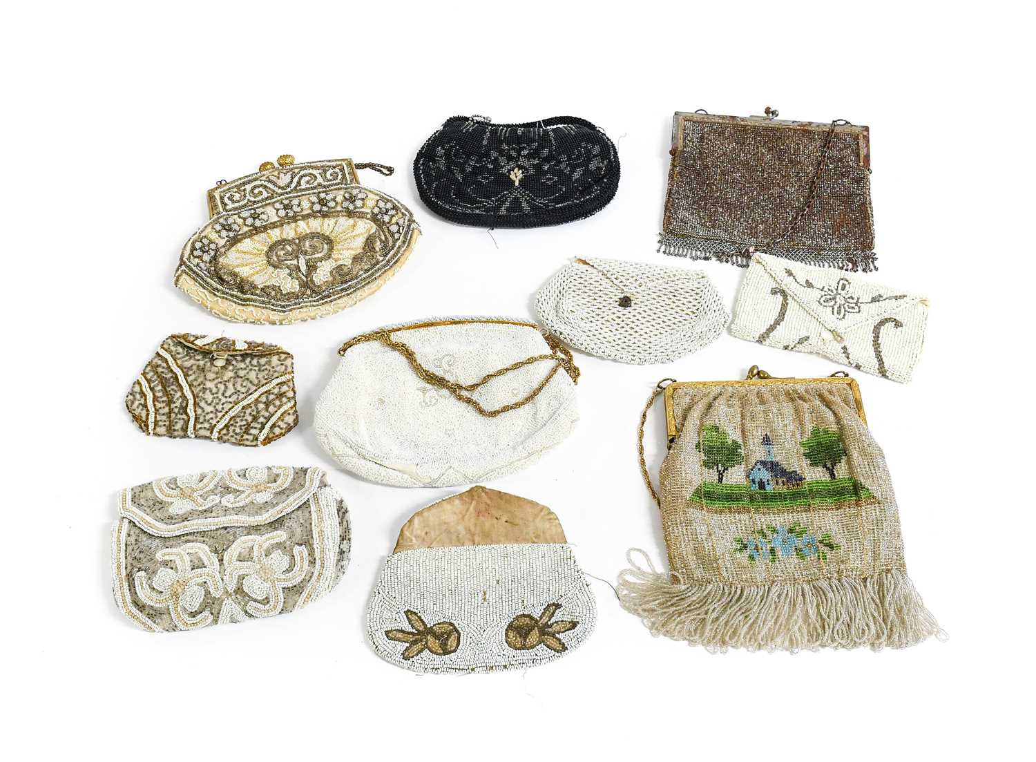 Early 20th Century Evening Bags, comprising five similar white and silver bead small purses and