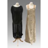 Circa 1920s Black Chiffon Dress with short sleeves, drop waist, paste stone detail to the waist,