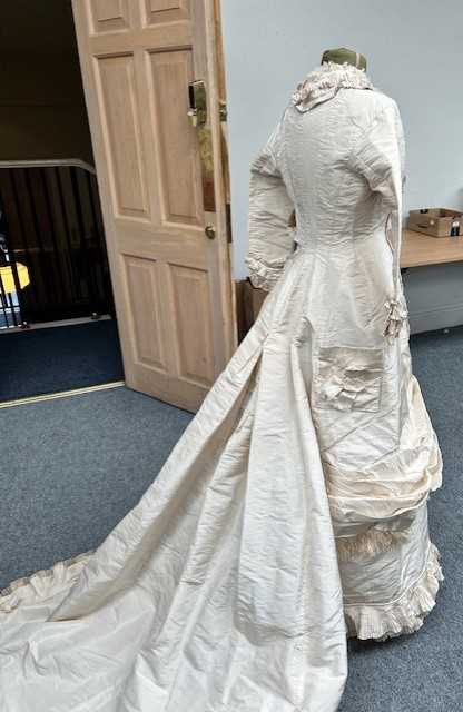 Victorian Cream Silk Wedding Dress with multi pleated trims to the front, cuffs and hem, button - Image 6 of 11