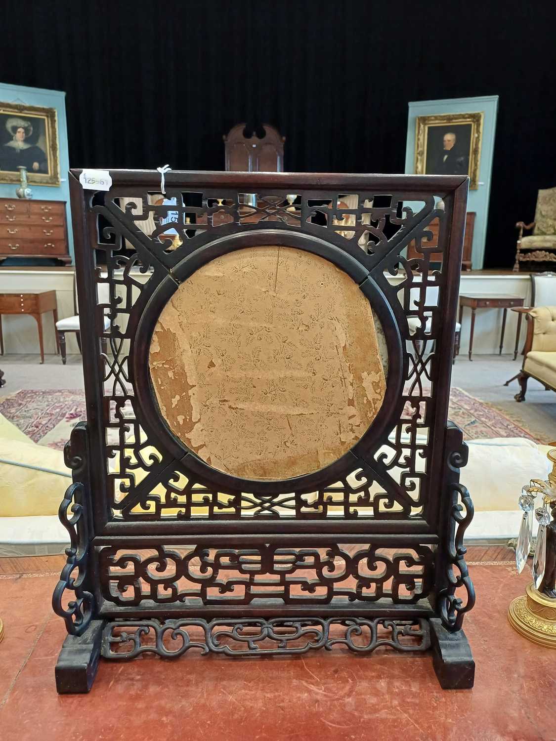 A Chinese Porcelain-Mounted Hardwood Table Screen, 19th century, the circular plaque painted in - Image 7 of 16