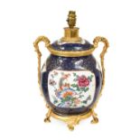 A Chinese Porcelain Ginger Jar and Cover, 18th century, with later gilt bronze mounts and now as a