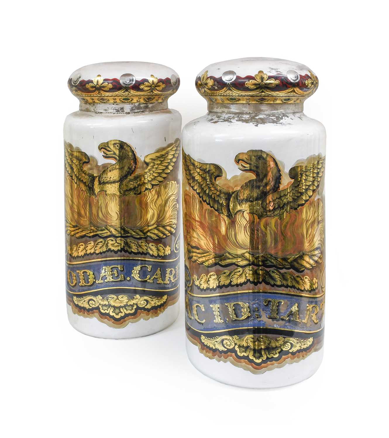A Pair of Victorian Glass Pharmacy Shop Display Jars and Covers, of cylindrical form, with phoenix