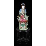 A Chinese Porcelain Figure of Guanyin, Qing Dynasty, late 18th/19th century, typically modelled