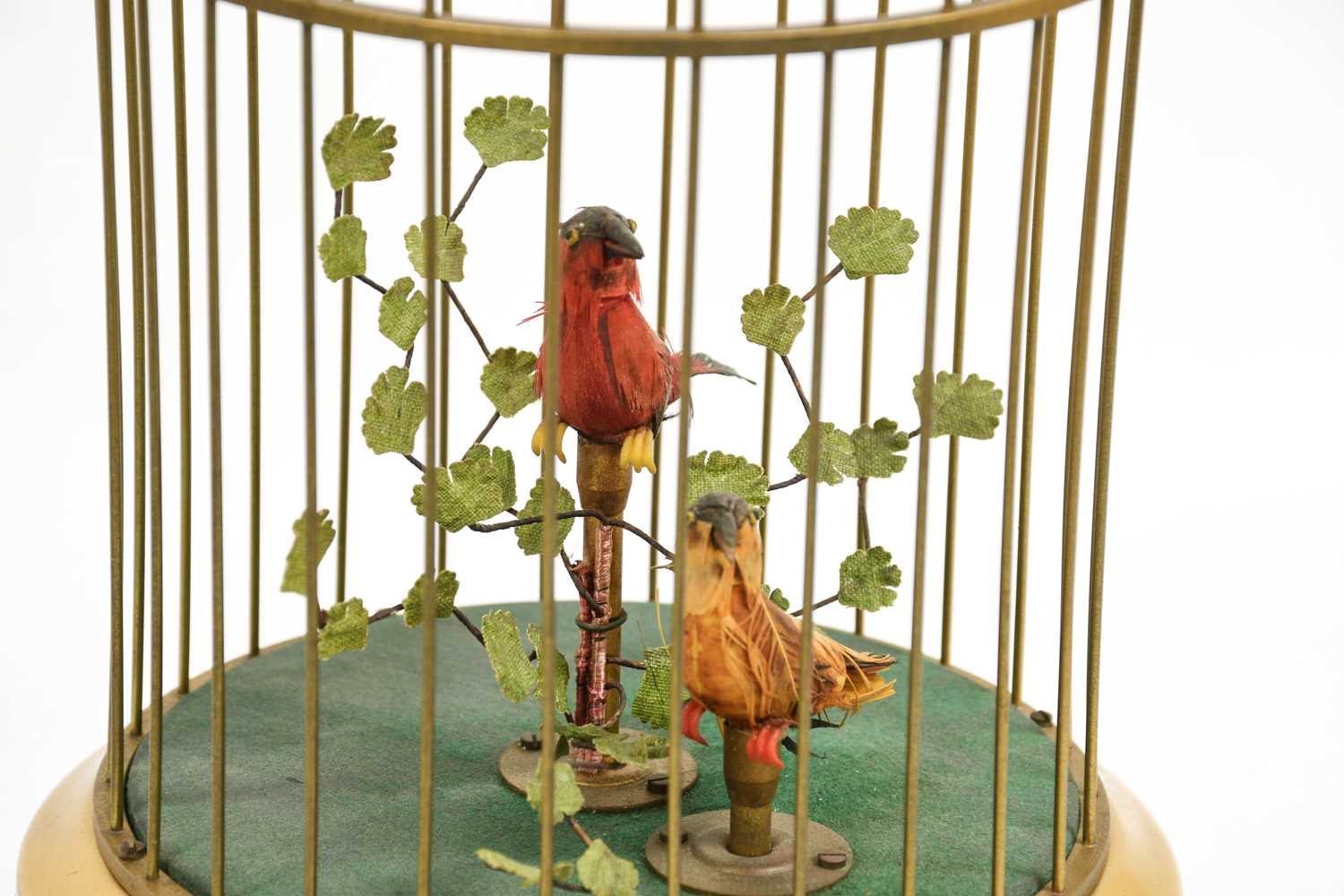 A Singing Bird Automata, 20th century, with two birds and a tree in a brass domed cage, on a drum - Image 2 of 2