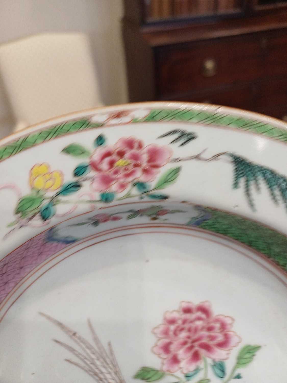 A Chinese Porcelain Bowl, Qianlong, painted in the famille rose palette with trailing peonies - Image 8 of 9