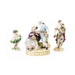 A Meissen Porcelain Figure Group, late 19th century, as a lady and gent, on a rockwork base on