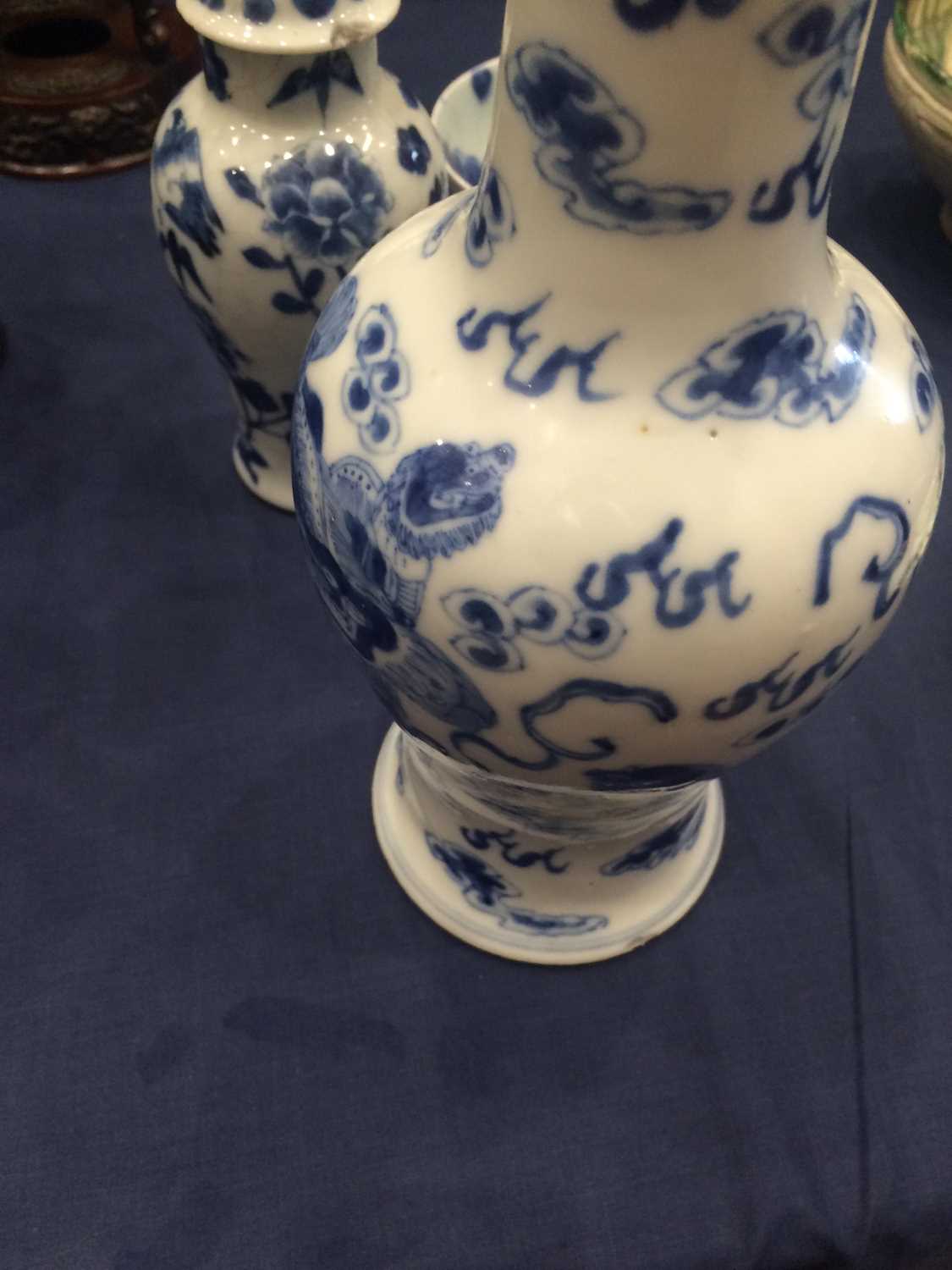 A Chinese Porcelain Yen Yen Vase, Kangxi mark but 19th century, painted in underglaze blue with lion - Image 14 of 16