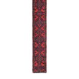 Narrow Ushak Runner Central West Anatolia, circa 1920 The tomato red field with a column of