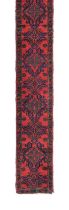 Narrow Ushak Runner Central West Anatolia, circa 1920 The tomato red field with a column of