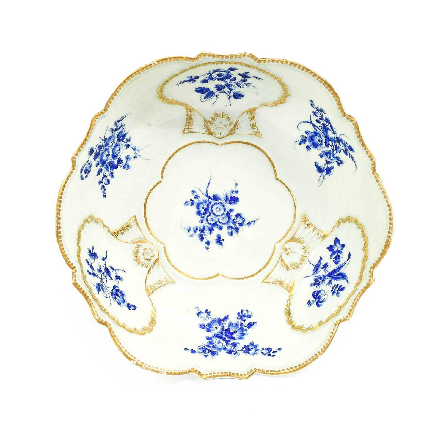 A Worcester Porcelain Junket Dish, circa 1770, with scalloped rim and moulded with shells, edged