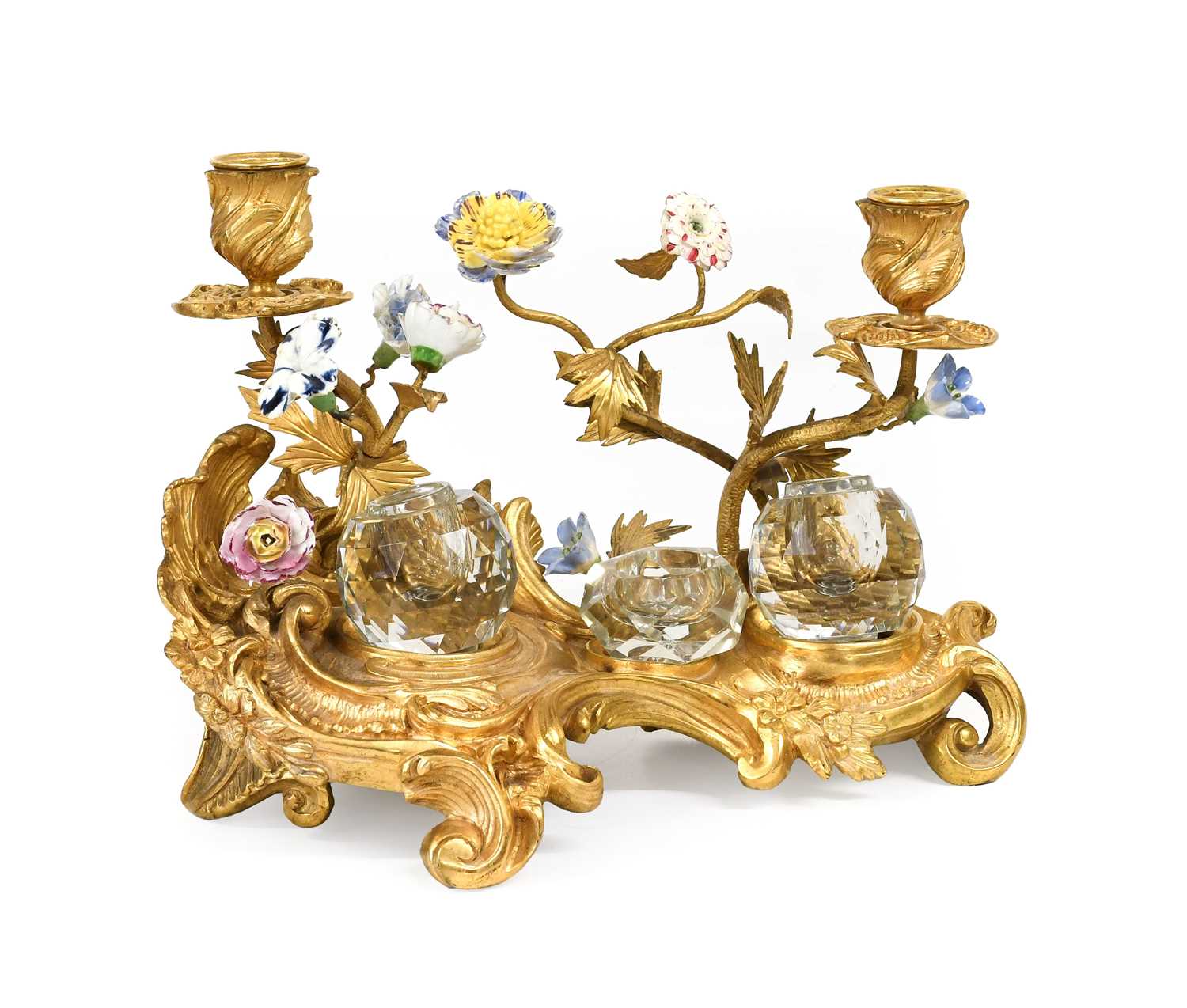 A French Gilt-Bronze Inkstand, in Louis XV style, with two leaf-sheathed sconces on leafy tendrils
