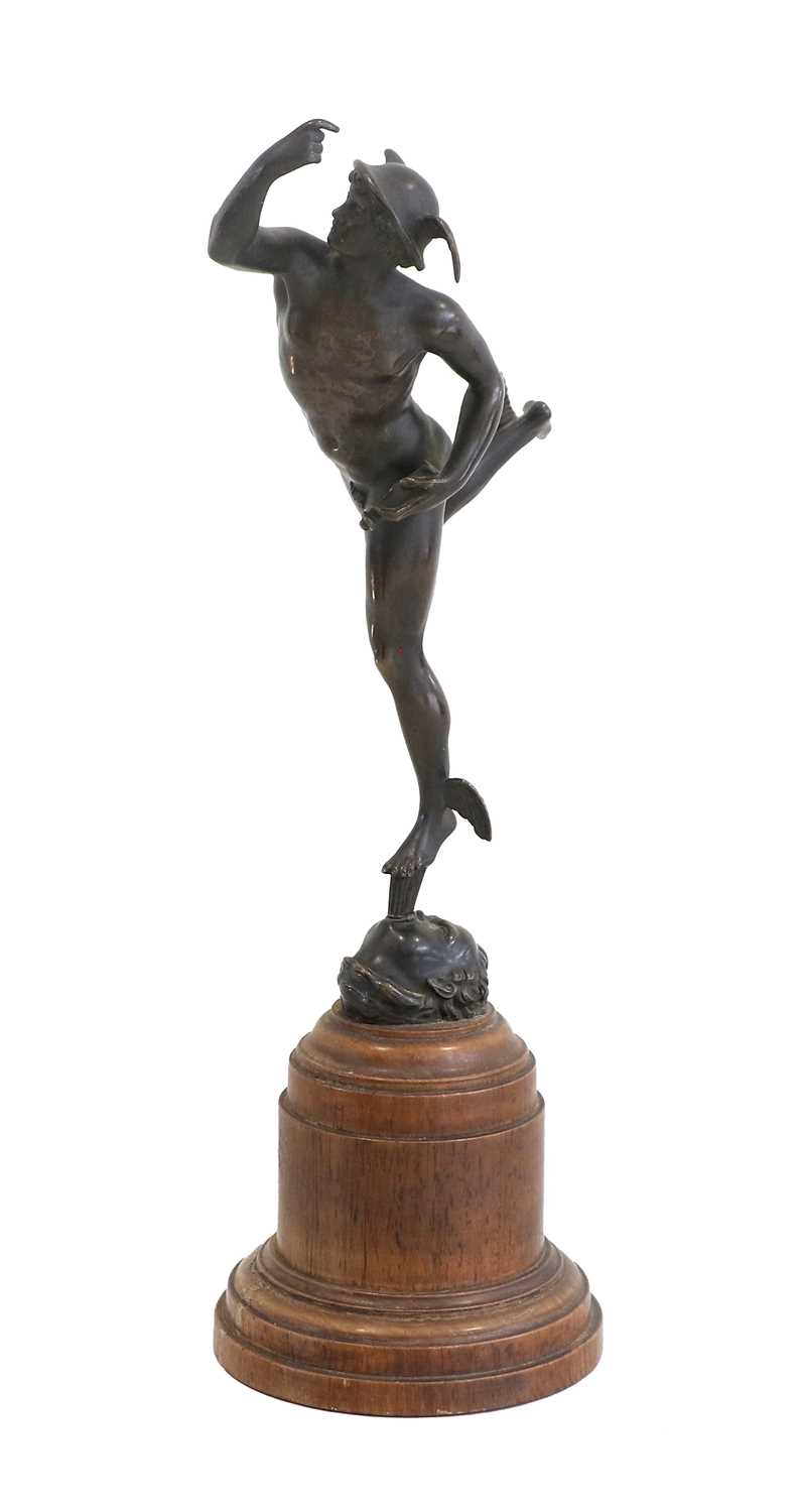 After Giambologna: A Bronze Figure of Mercury, on a turned wood column and circular plinth 36cm