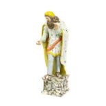 A Staffordshire Pearlware Figure of St Philip, circa 1810, the bearded figure stood wearing a long
