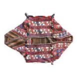 ~ Kurdish Soumakh Cradle Bag, early 20th century Comprised of four panels, the side panels with