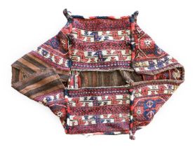 ~ Kurdish Soumakh Cradle Bag, early 20th century Comprised of four panels, the side panels with