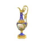 A Sèvres Style Porcelain and Gilt Metal Mounted Ewer, early 20th century, blue ground, with tooled