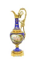 A Sèvres Style Porcelain and Gilt Metal Mounted Ewer, early 20th century, blue ground, with tooled