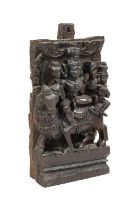 An Indian Carved Wood Architectural Section, 19th century, worked in high relief with Shiva and