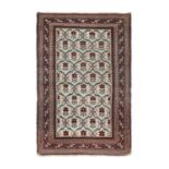 Amritsar Rug North West India, circa 1890 The ivory floral lattice field enclosed by narrow