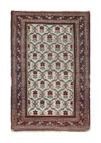 Amritsar Rug North West India, circa 1890 The ivory floral lattice field enclosed by narrow