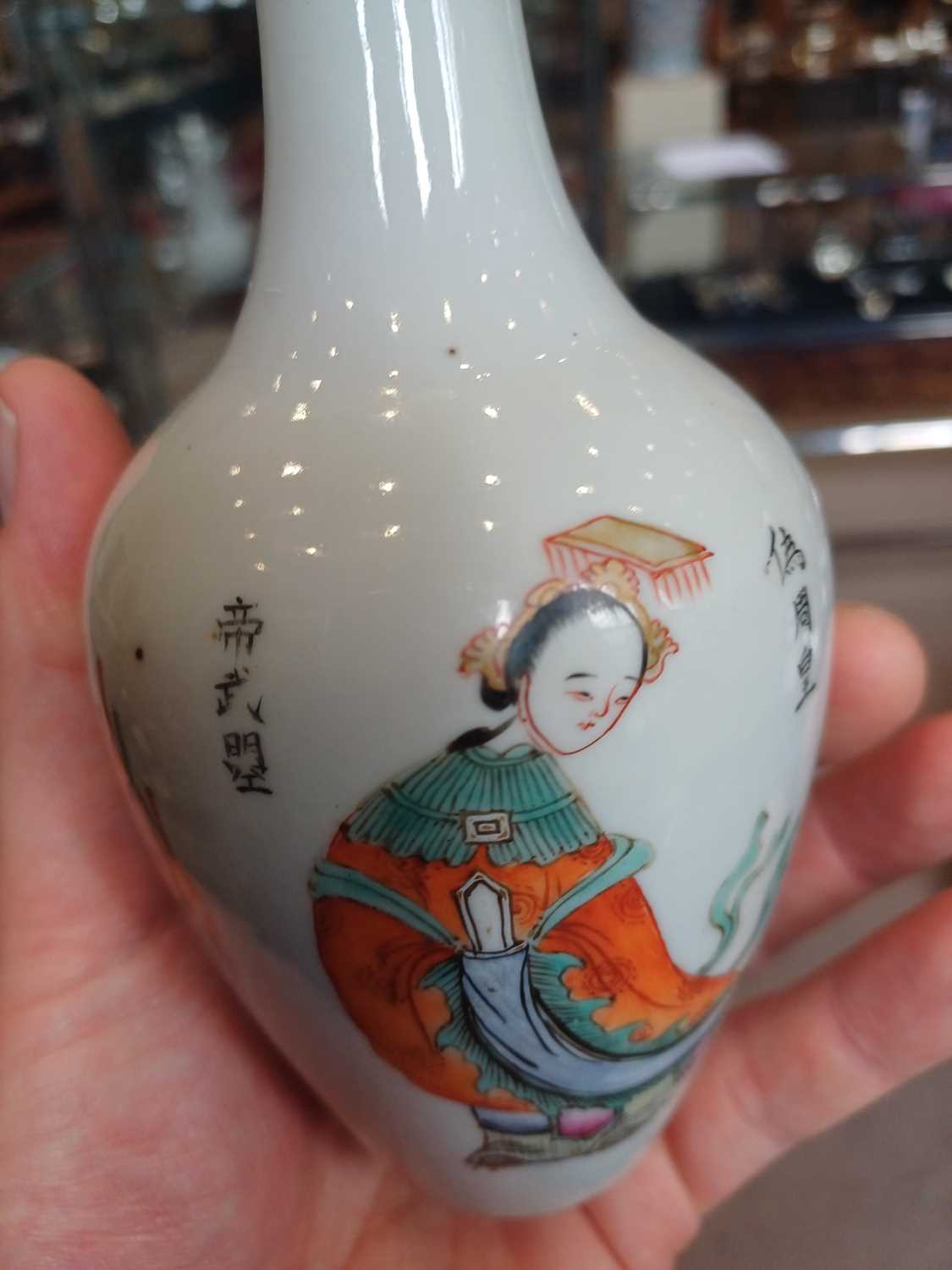 A Chinese Porcelain Bottle Vase, Daoguang, painted in famille rose enamels with two figures and - Image 3 of 12
