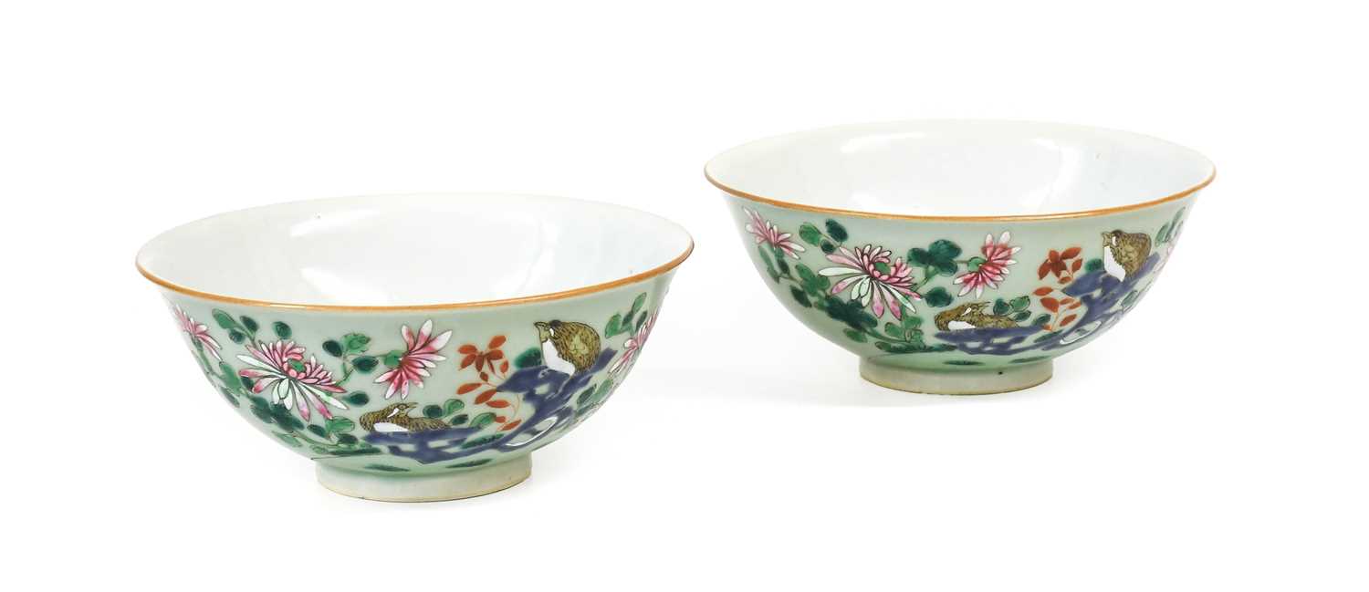 A Pair of Chinese Porcelain Bowls, Qianlong reign marks but not of the period, painted in famille