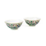 A Pair of Chinese Porcelain Bowls, Qianlong reign marks but not of the period, painted in famille
