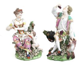 A Pair of Samson Porcelain Figures After Chelsea, 19th century, modelled as a boy eating grapes,