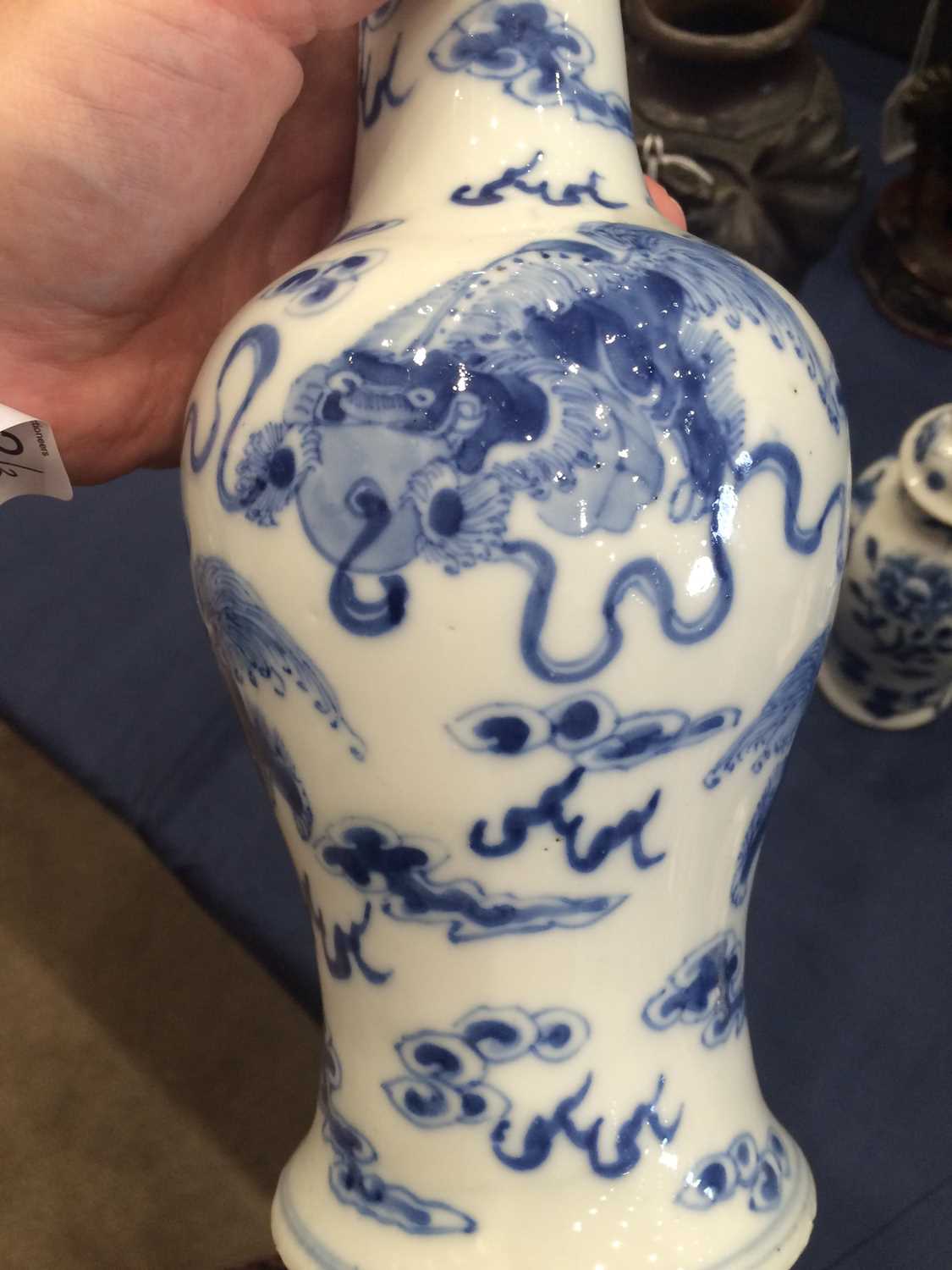 A Chinese Porcelain Yen Yen Vase, Kangxi mark but 19th century, painted in underglaze blue with lion - Image 10 of 16