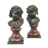 French School (19th century): A Pair of Bronze Busts of Young Girls, each with their hair tied back,