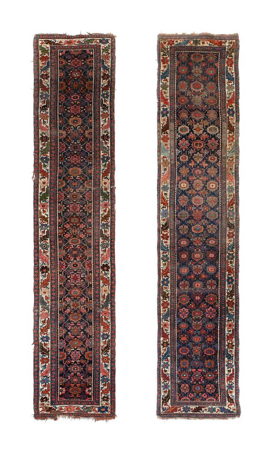 "Pair" of Bidjar Runners Iranian Kurdistan, circa 1900 Each with an indigo angular lattice field