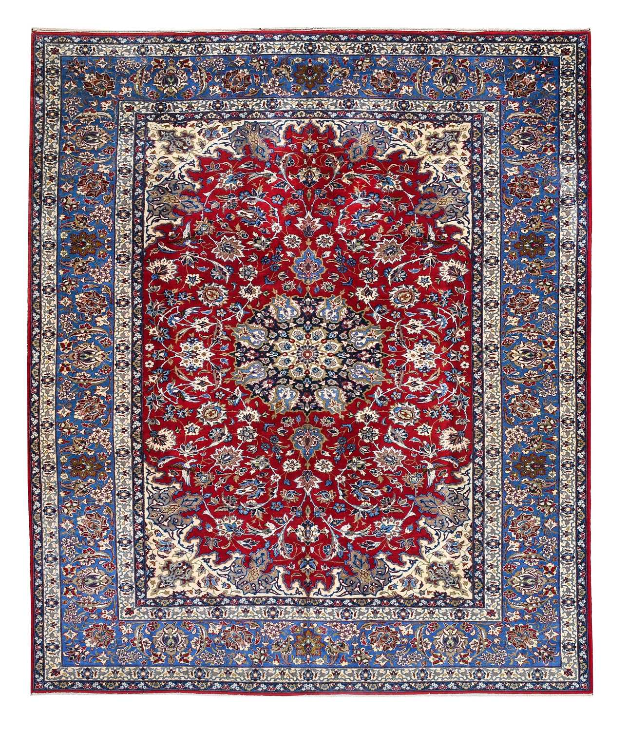 Isfahan Carpet Central Iran, circa 1920 The raspberry field of flowering vines around an indigo