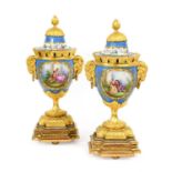 A Pair of Gilt-Metal-Mounted Sèvres-Style Porcelain Vases and Covers, 19th century, of urn shape