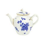 A Worcester Porcelain Teapot and Cover, circa 1770, with floral knop and entwined handle, edged in