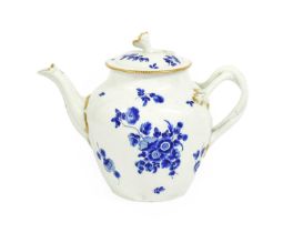 A Worcester Porcelain Teapot and Cover, circa 1770, with floral knop and entwined handle, edged in