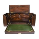 A Brass-Bound Rosewood Travelling Writing Box, 1st half 19th century, the hinged rectangular top