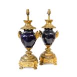 A Pair of Gilt-Metal-Mounted Blue-Glazed Lamp Bases, in Louis XV style, of ovoid form with ram's