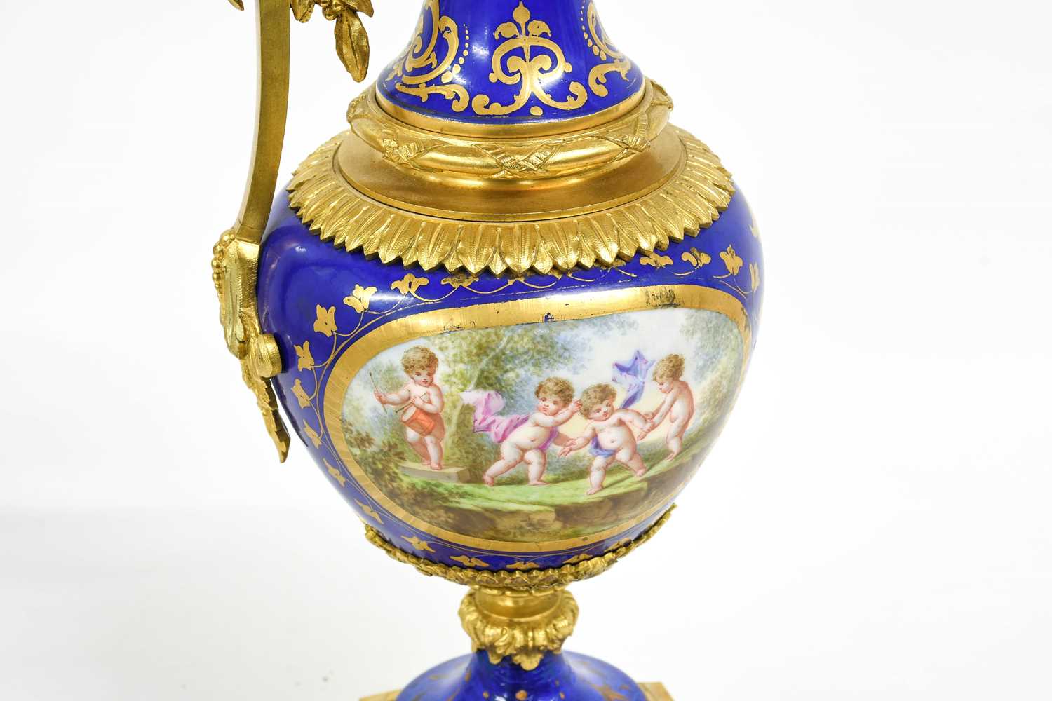 A Sèvres Style Porcelain and Gilt Metal Mounted Ewer, early 20th century, blue ground, with tooled - Image 2 of 2