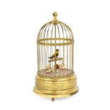 A Singing Bird Automaton, 20th century, the yellow-plumed bird perched within a domed wirework