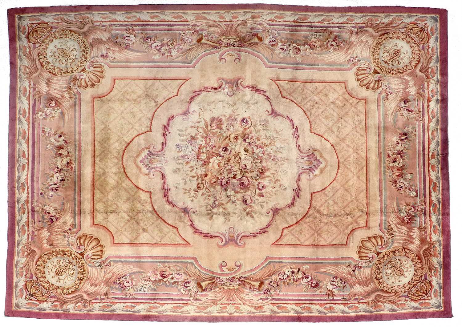 Austrian Carpet of Savonnerie Design, circa 1920 The diamond lattice field centred by a spray of